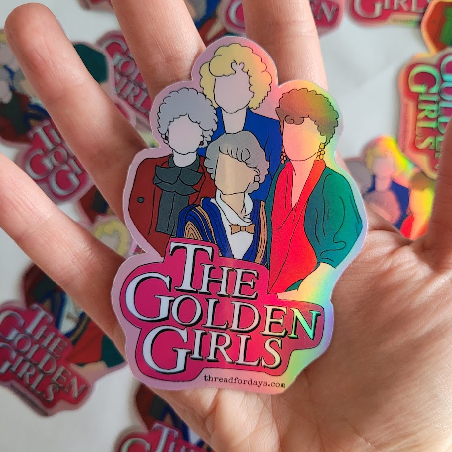 golden girls sticker held in hand