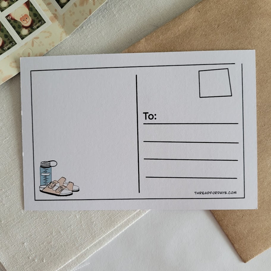 back of the wish you were queer postcard