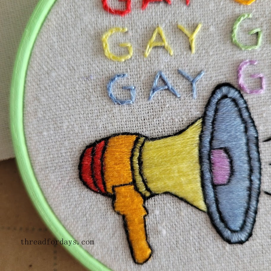 close up on stitches of the say gay hoop