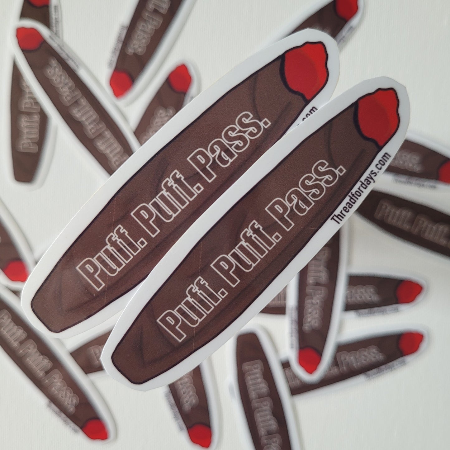 close up of puff puff pass sticker