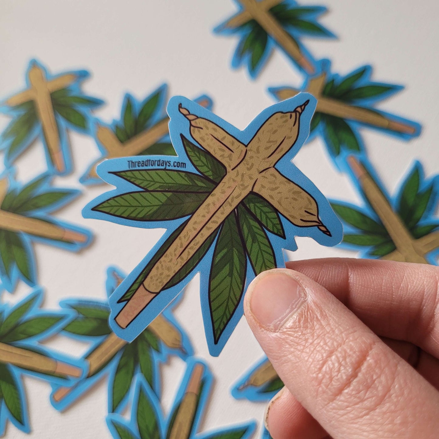 cross joint sticke rheld in hand