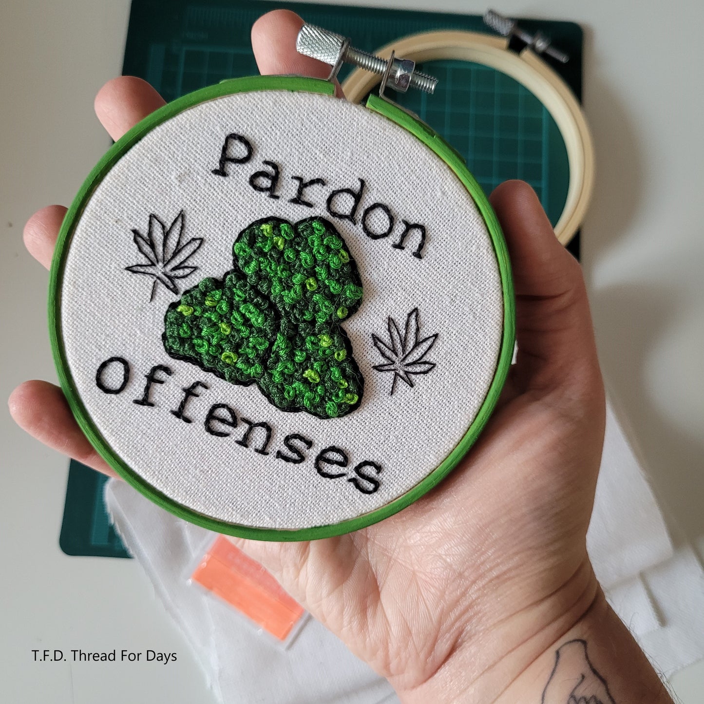 Pardon Ouid offense hoop held in hand