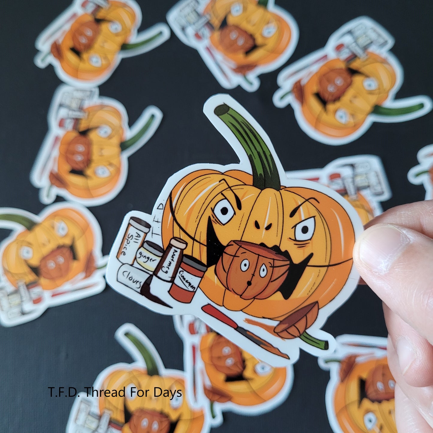 silence of the yams sticker held in fingers