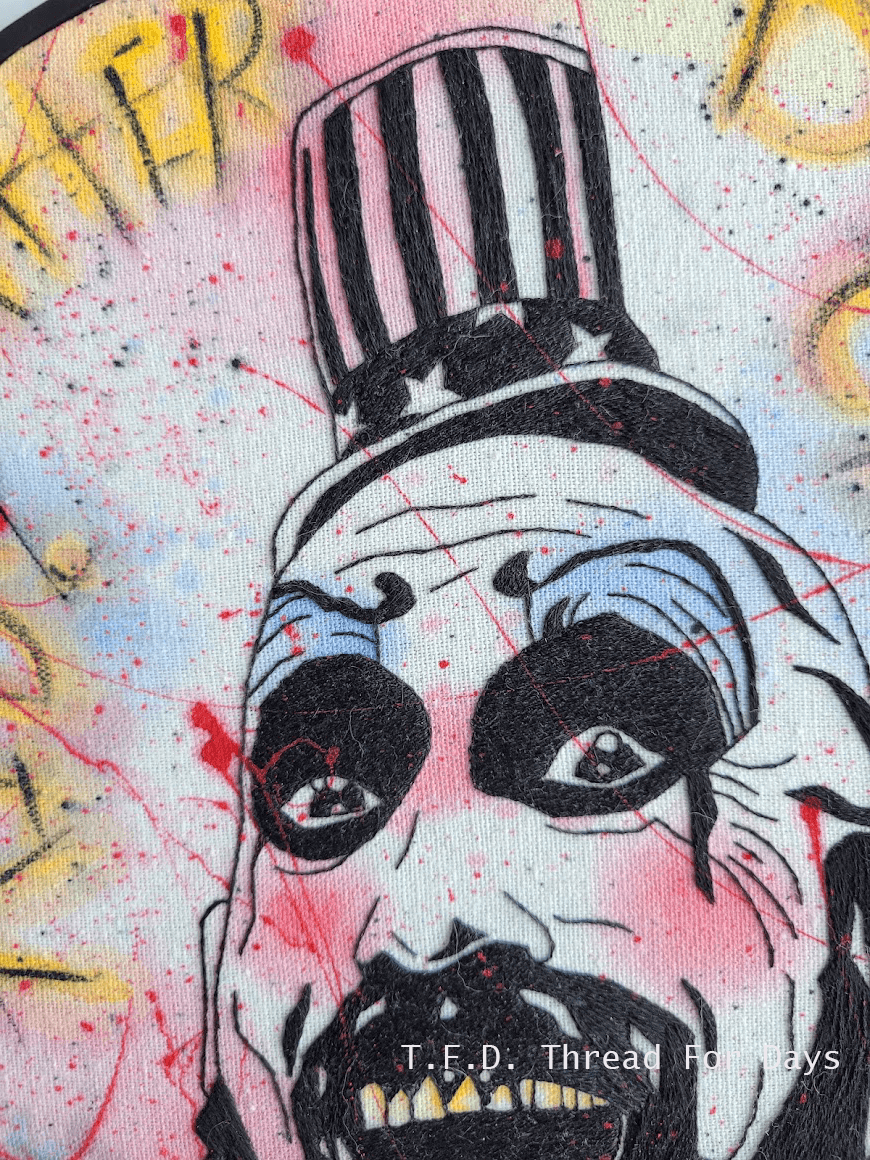 close up on captain Spalding embroidery stitches.