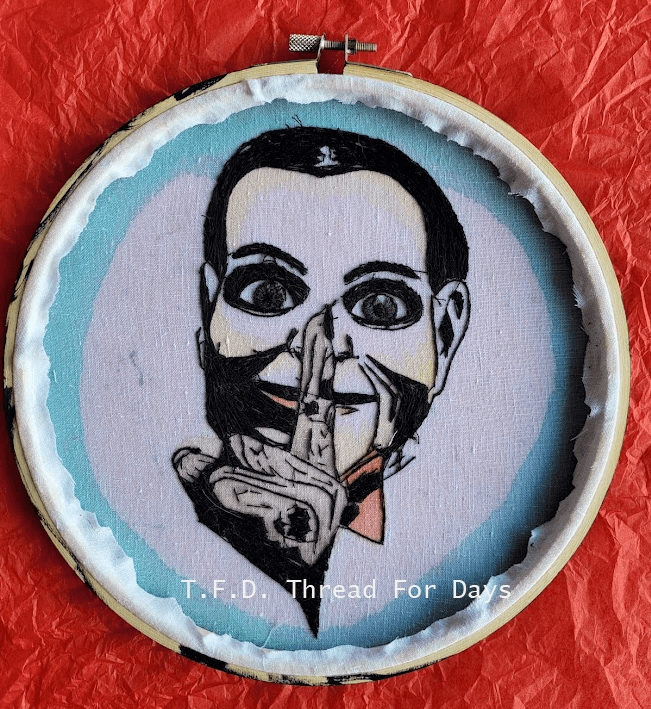 The back of Billy the doll's hoop