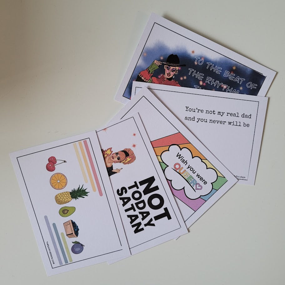 5 pride postcards fanned out on a white table