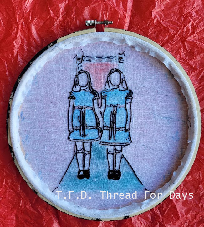 back of the shining twins hoop