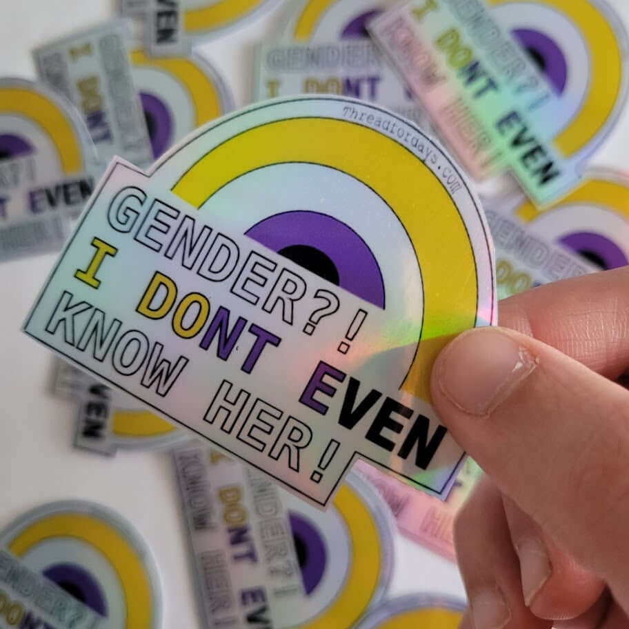 gender I dont even know her sticker held in hand