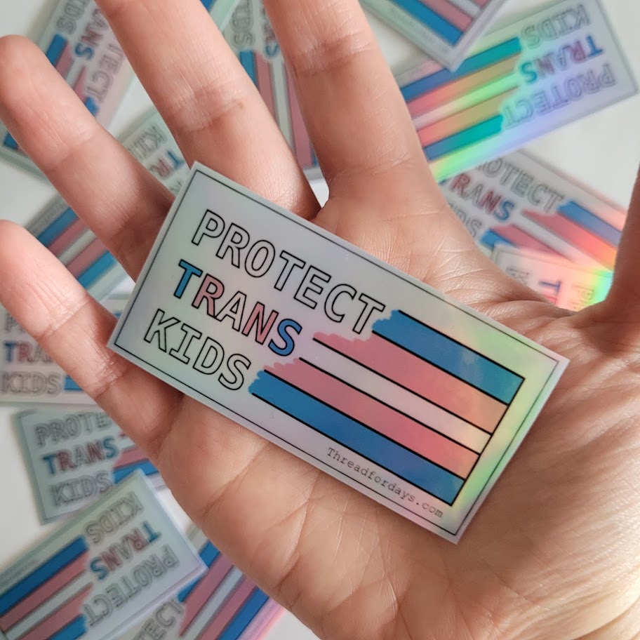protect trans kids held in palm