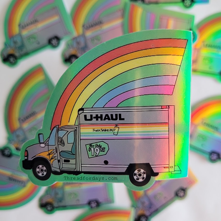close up of rainbow uhaul sticker