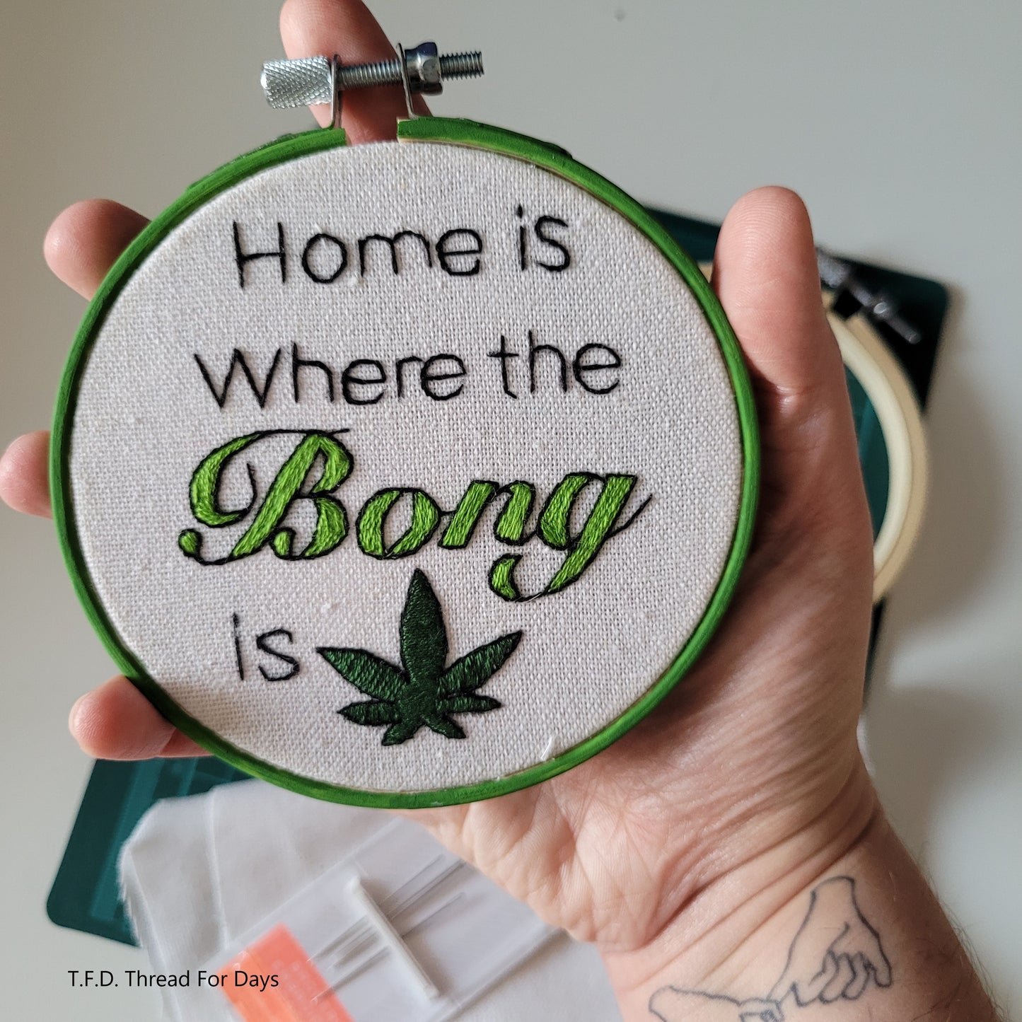 Home is where the bong is hoop held in hand