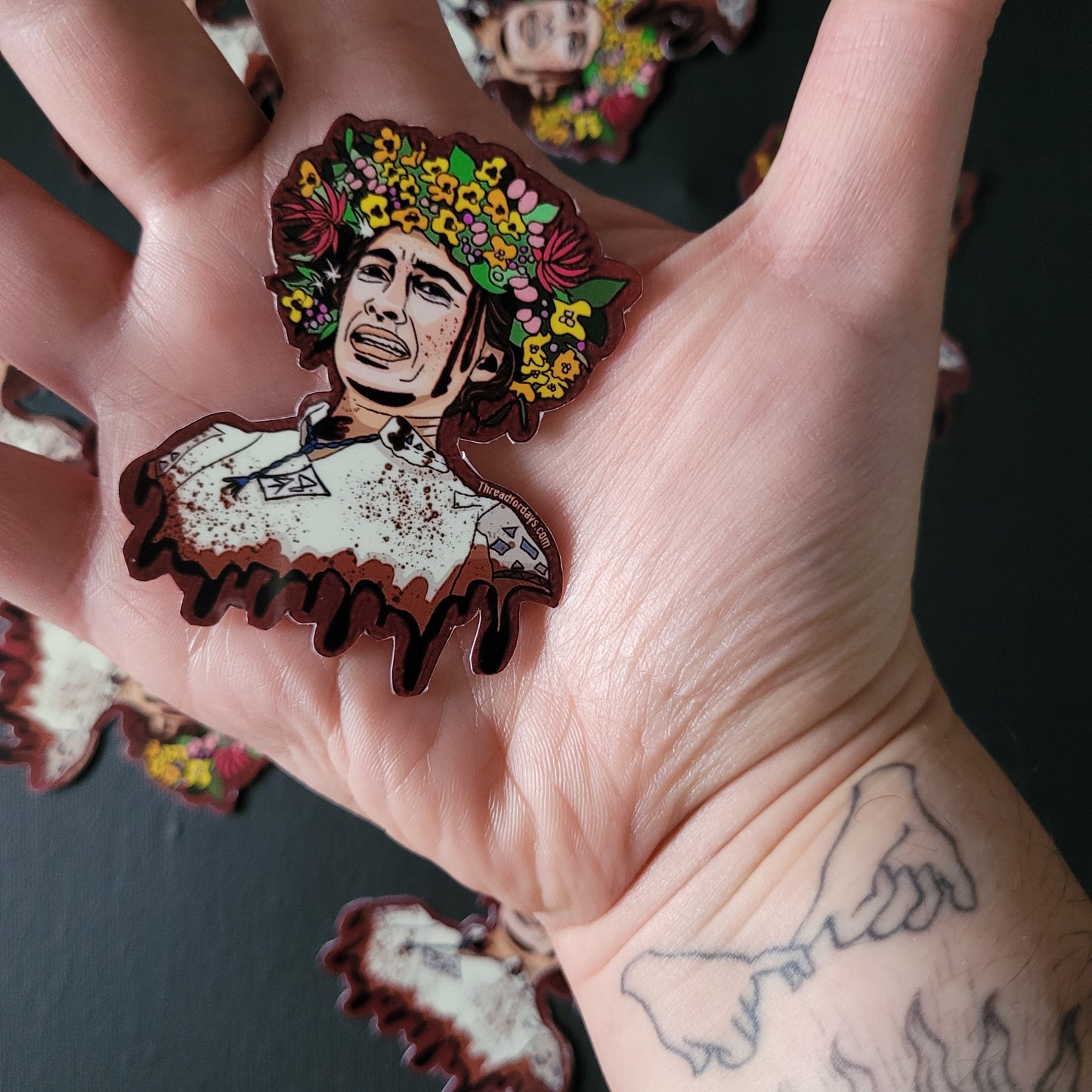 midsommar sticker in palm of hand to demonstrate size