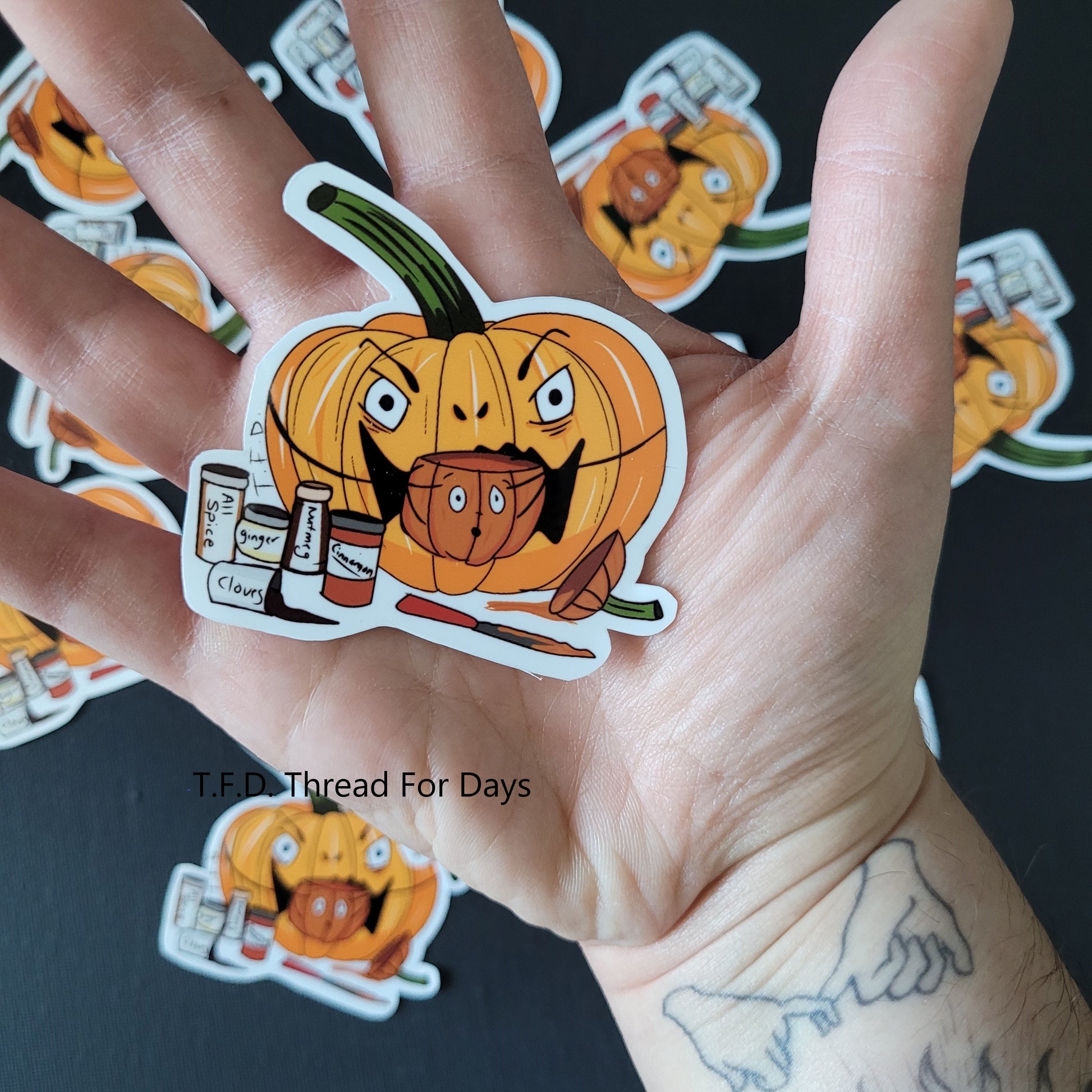 silence of the yams sticker held in palm of hand to demonstrate size