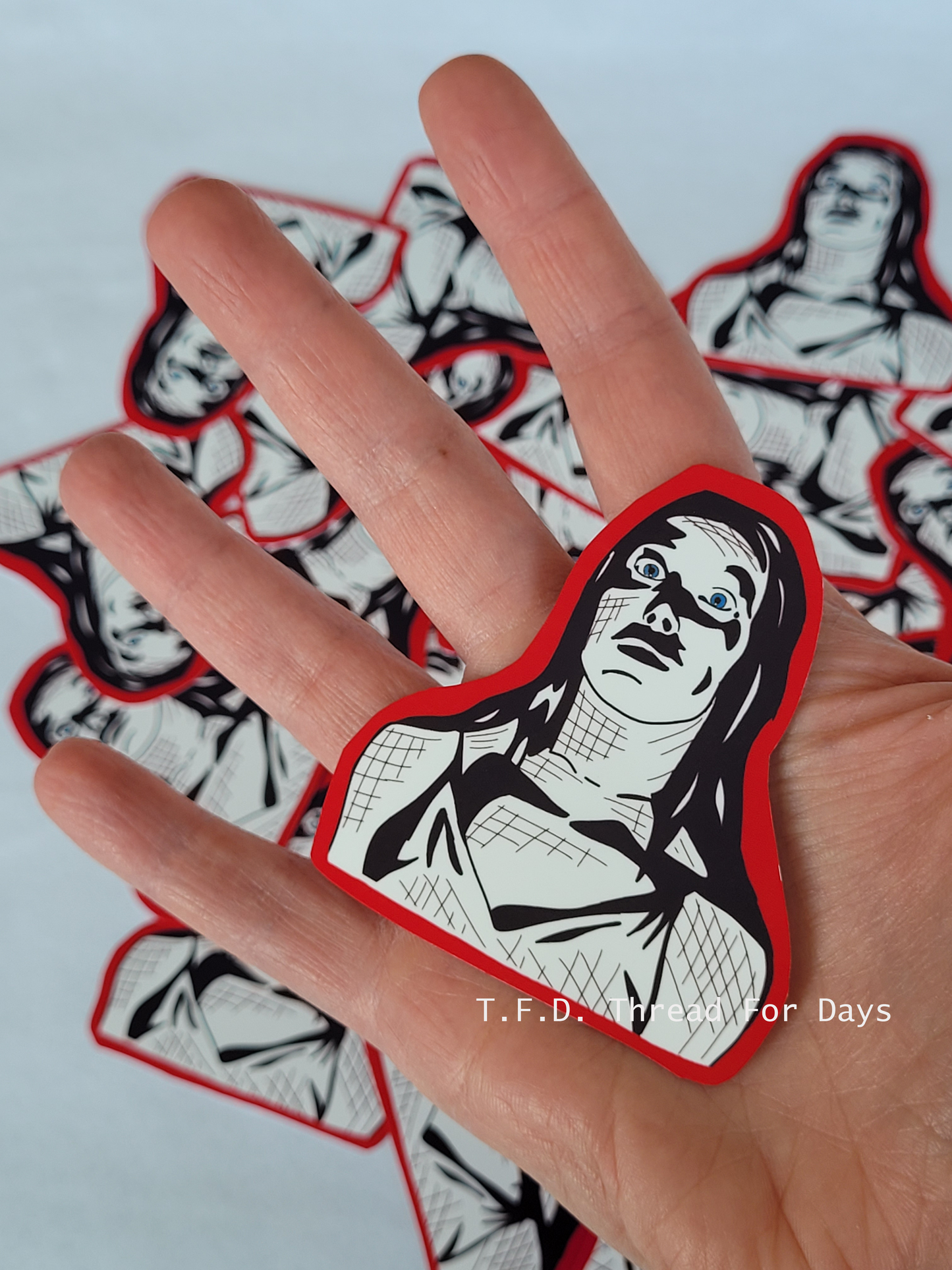 Carrie sticker in palm of hand