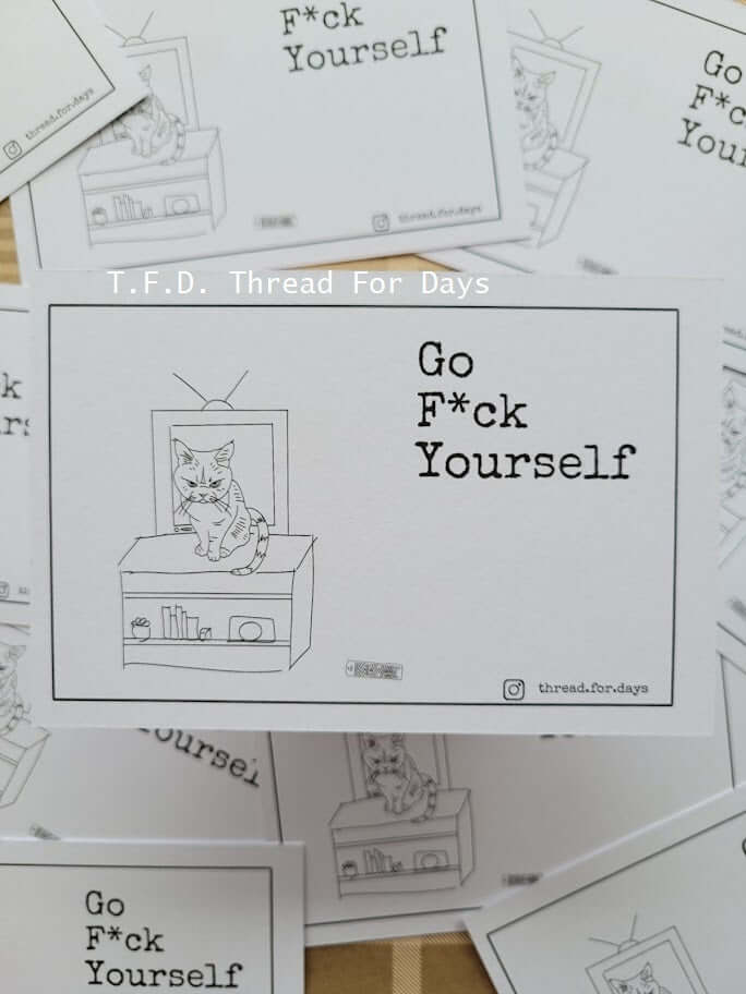 front of Go F*ck yourself postcard