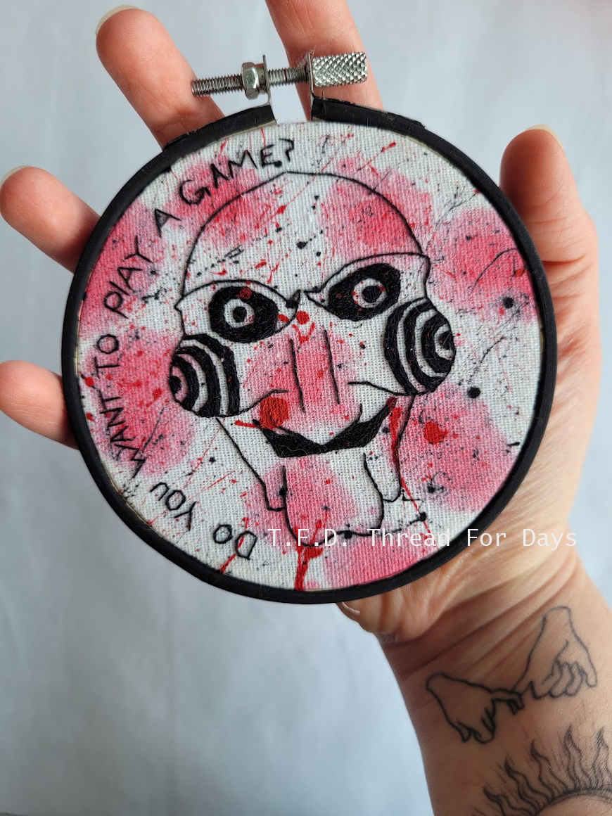 4 inch jigsaw mask hoop held in palm of hand