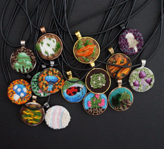 many embroidered pendants 