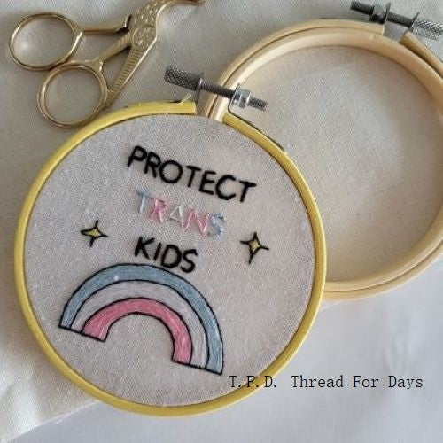 close up of Protect trans kids hoop