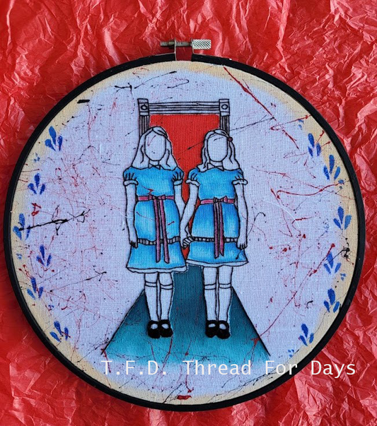 front of the shining twins hoop